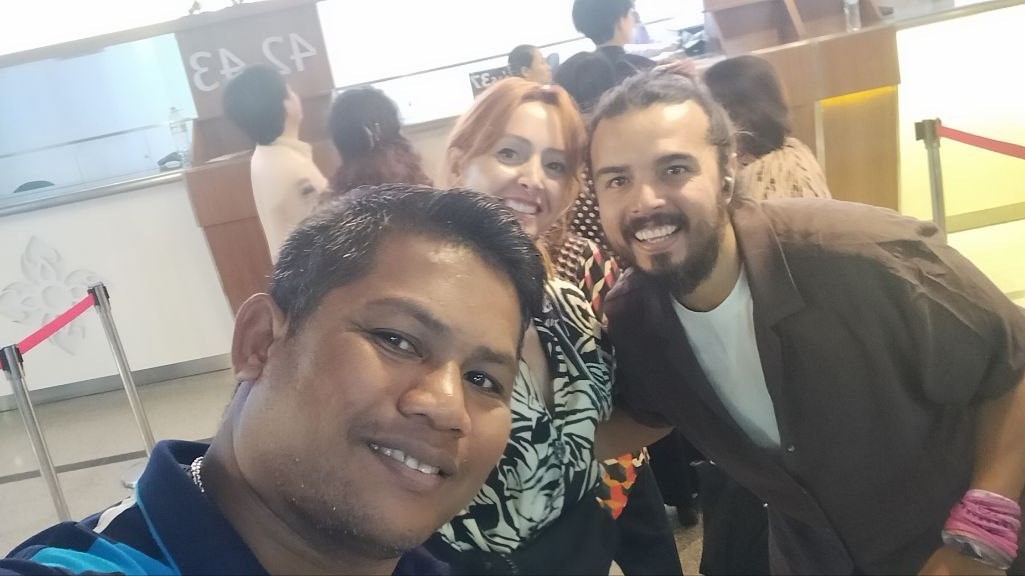 Em with his customers
